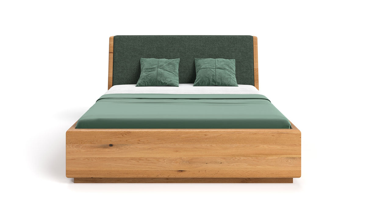 Designer Holzbett Cassian aus massiver Eiche mit Stauraum