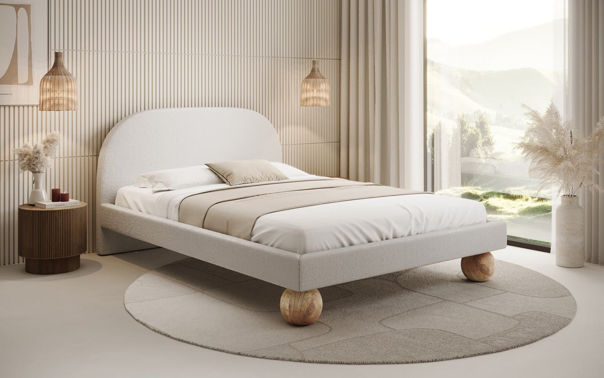 Designer Polsterbett Milo in Bouclé mit runden Holzfüßen