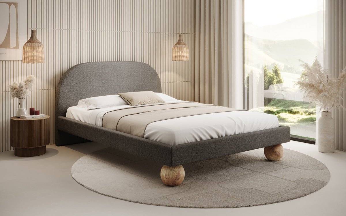 Designer Polsterbett Milo in Bouclé mit runden Holzfüßen