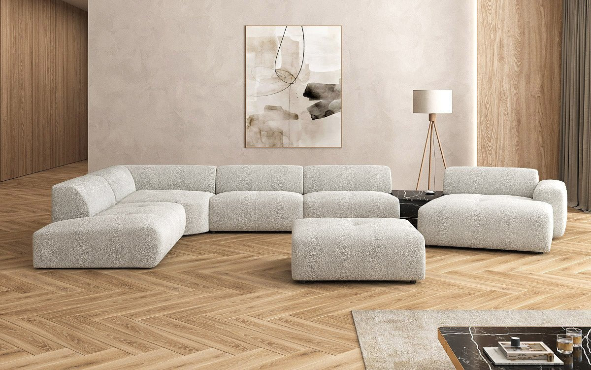 Canapé d'angle design Calm avec pouf d'appoint en Bouclé