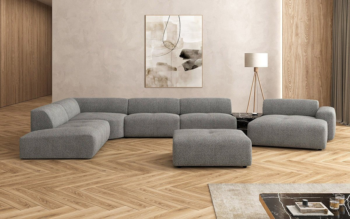 Canapé d'angle design Calm avec pouf d'appoint en Bouclé