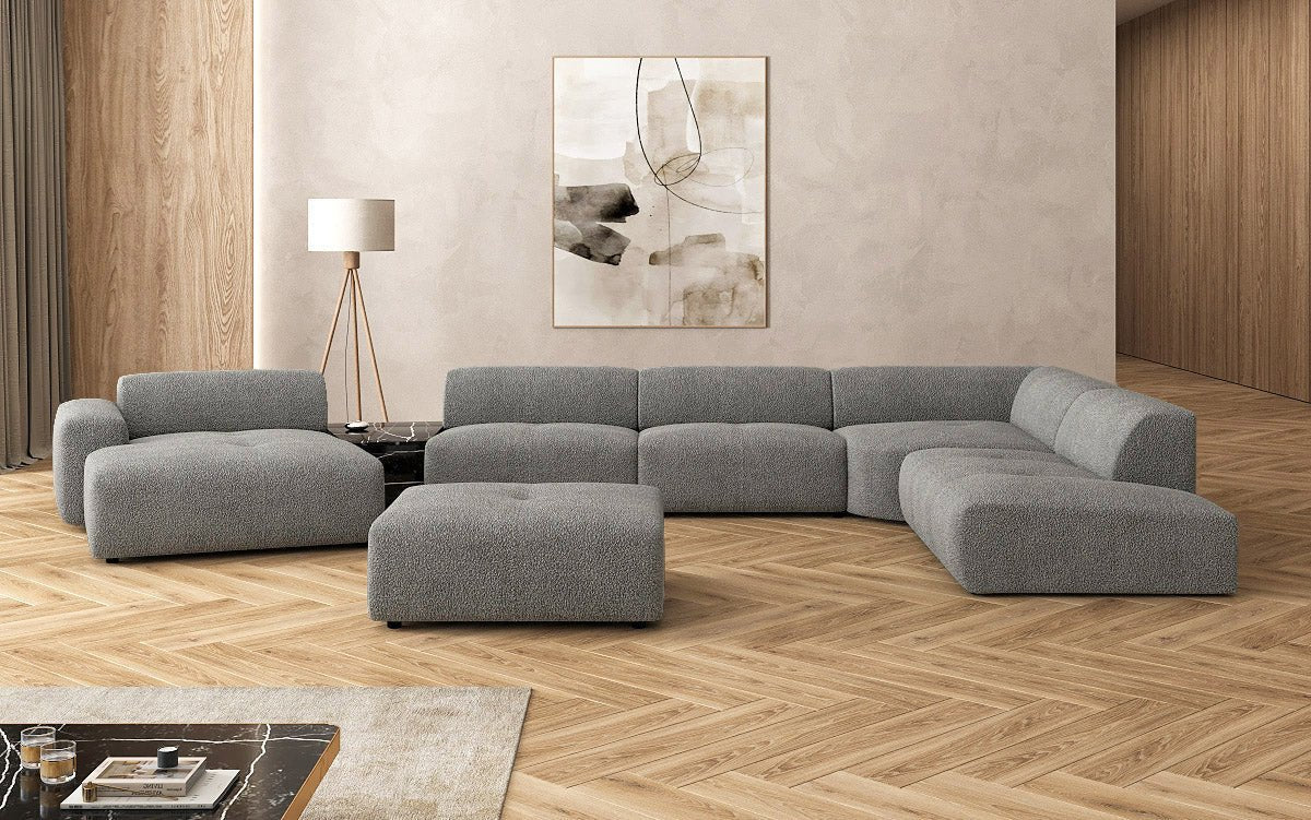 Canapé d'angle design Calm avec pouf d'appoint en Bouclé