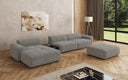 Designer Ecksofa Calm mit Beistellhocker und Beistelltisch in Bouclé