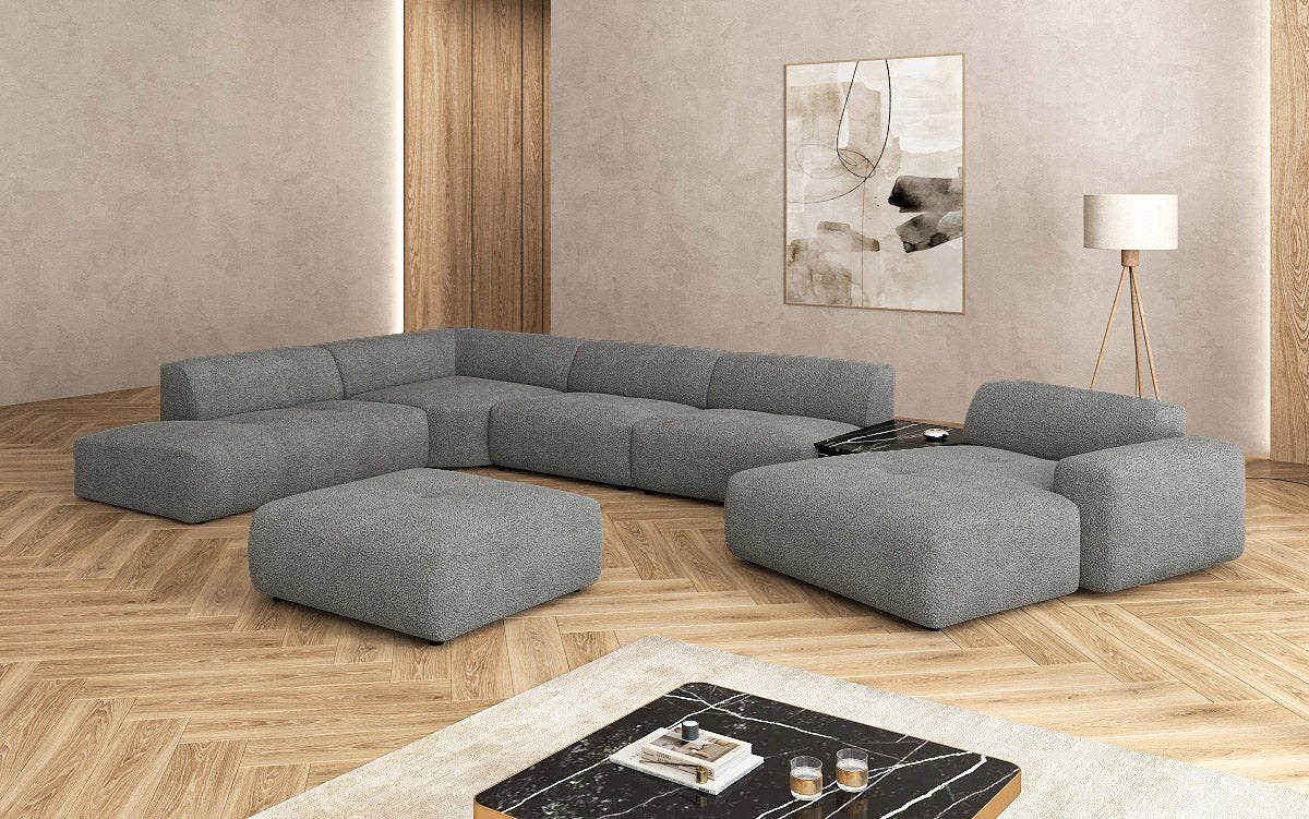 Canapé d'angle design Calm avec pouf d'appoint en Bouclé