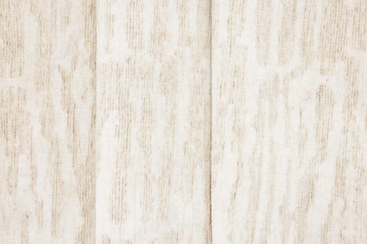 Teppich Inara – in Beige oder Grau aus Polyester & Baumwolle