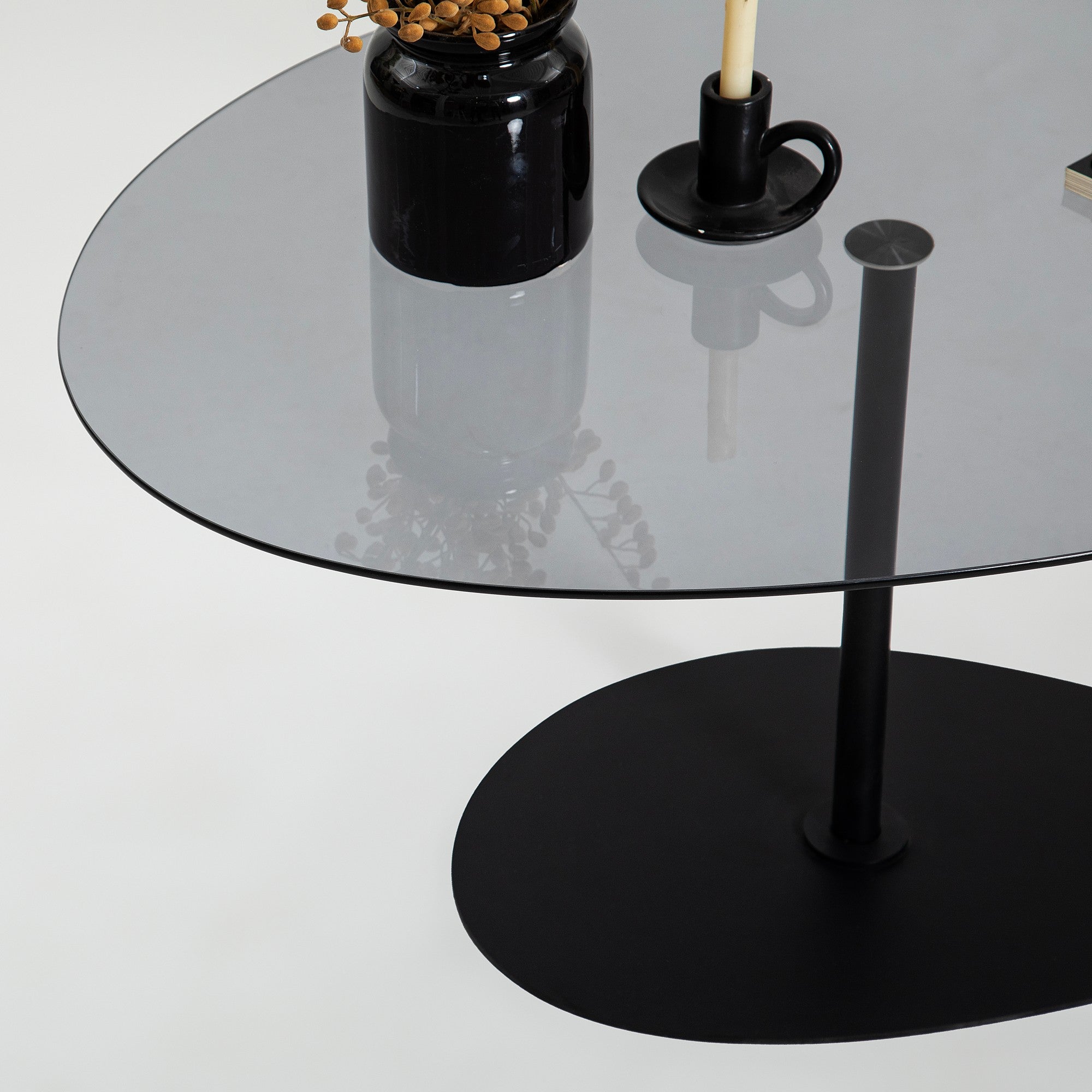 Table basse Dovira - avec plateau en verre et structure en métal noir