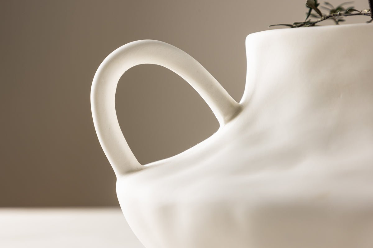 Pot de fleurs Vian - en forme ronde avec des anses marquantes en céramique