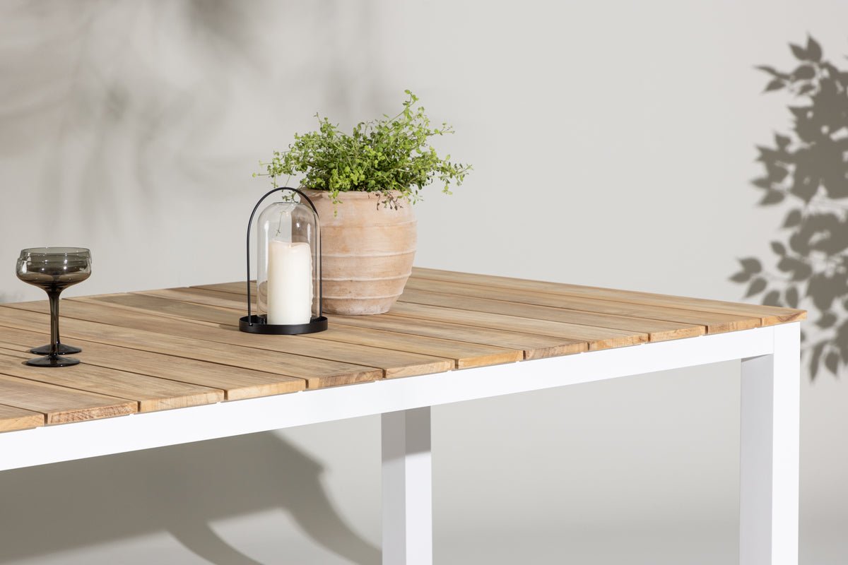 Table à manger de jardin Eliano - 210x100 cm avec un plateau en teck aspect naturel