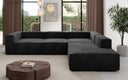 Designer Ecksofa Lesley mit langer Ottomane in Samt