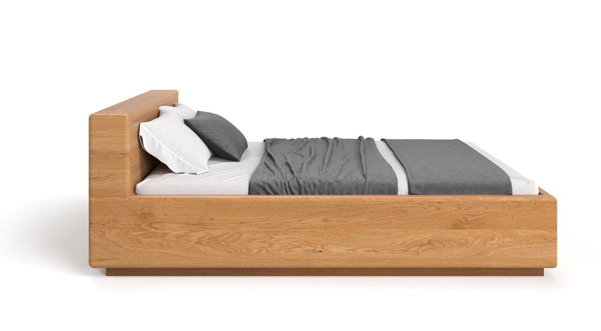Lit en bois massif Calveno en chêne avec rangement et tête de lit droite