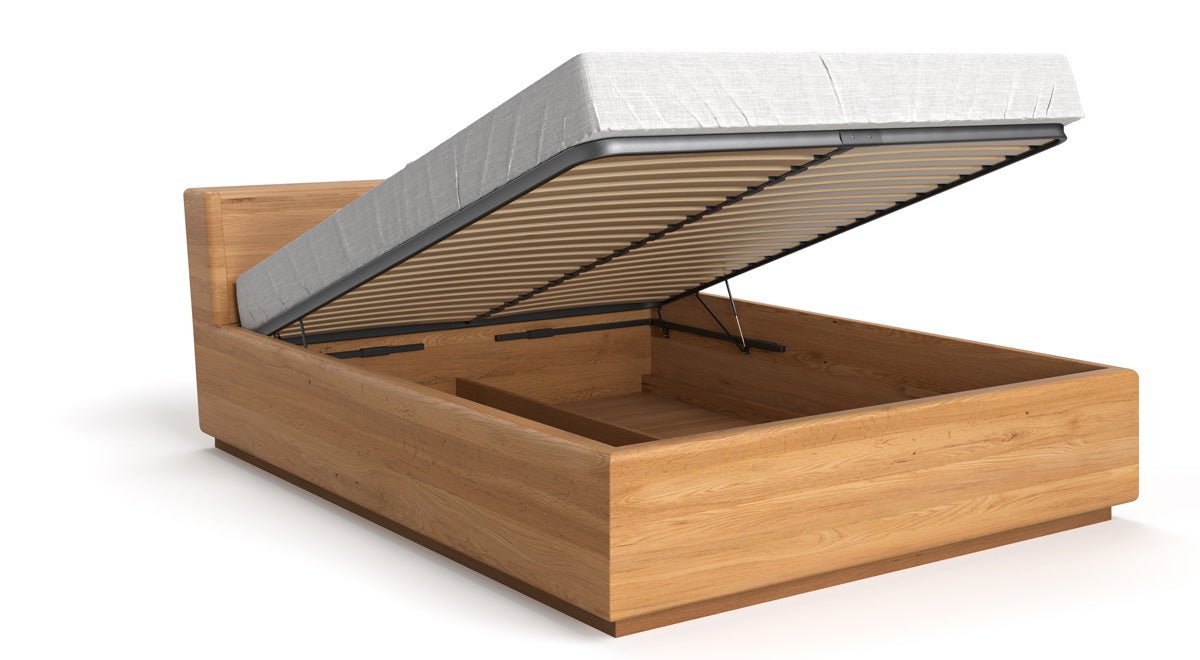 Designer Holzbett Calveno aus massiver Eiche mit Stauraum und geneigtem Headboard