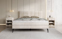 Lit boxspring Vera en Côtelé avec pieds hauts