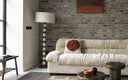 Sofa Talaro mit gerafftem Samtbezug